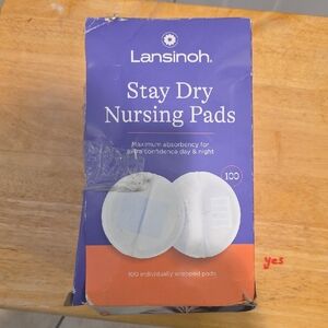 Lansinoh Stay Dry Nursing Pads - Purple and White Packaging